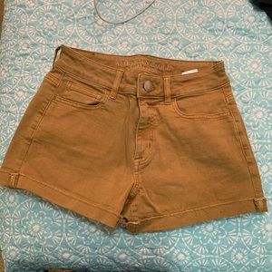 Mustard yellow/ tan shorts